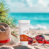 کرم ضدآفتاب هیدرودرم مدل Medium Beige SPF50، حجم 50 میلیلیتر